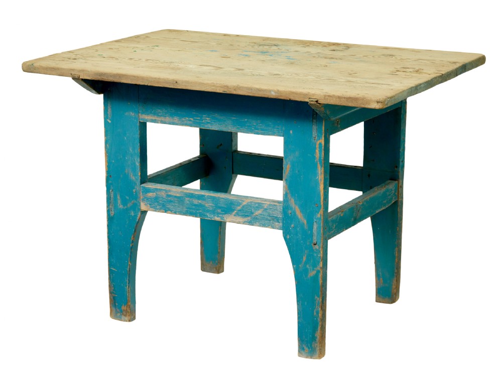 A 19th-century Swedish side table featuring an unpainted pine top set upon a vibrant blue painted wooden frame with cross-stretchers.