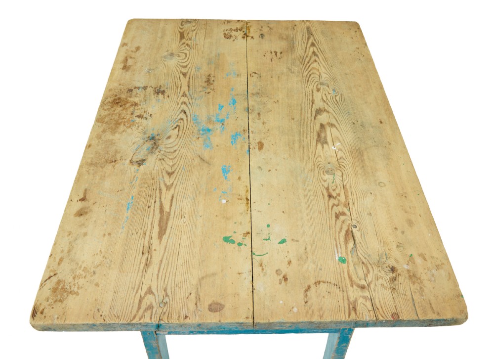 A 19th-century Swedish side table featuring an unpainted pine top set upon a vibrant blue painted wooden frame with cross-stretchers. View VI
