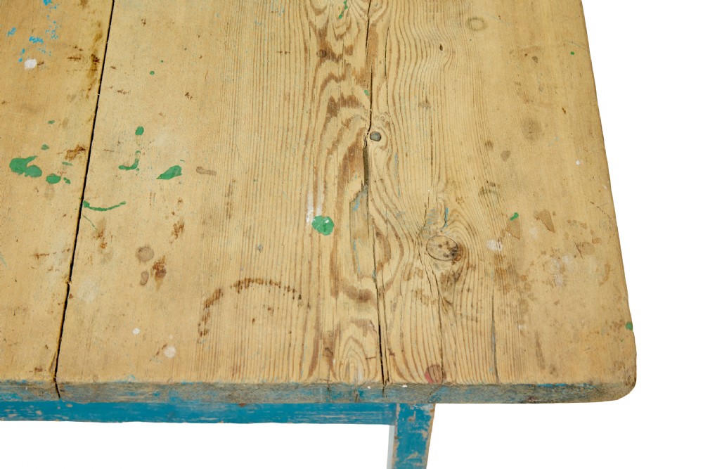A 19th-century Swedish side table featuring an unpainted pine top set upon a vibrant blue painted wooden frame with cross-stretchers. View VII