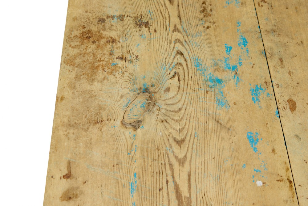 A 19th-century Swedish side table featuring an unpainted pine top set upon a vibrant blue painted wooden frame with cross-stretchers. View VIII