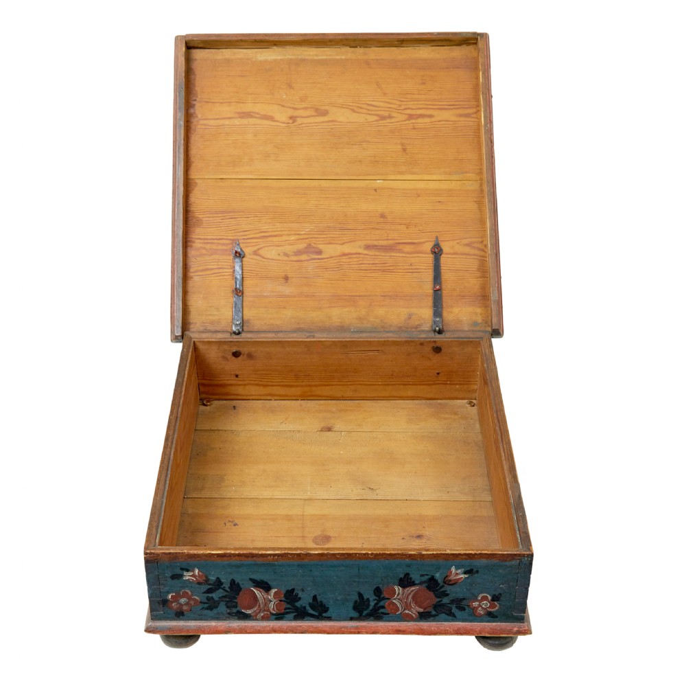 A 19th-century rectangular pine box painted teal blue with red floral motifs and small turned feet. View VIII