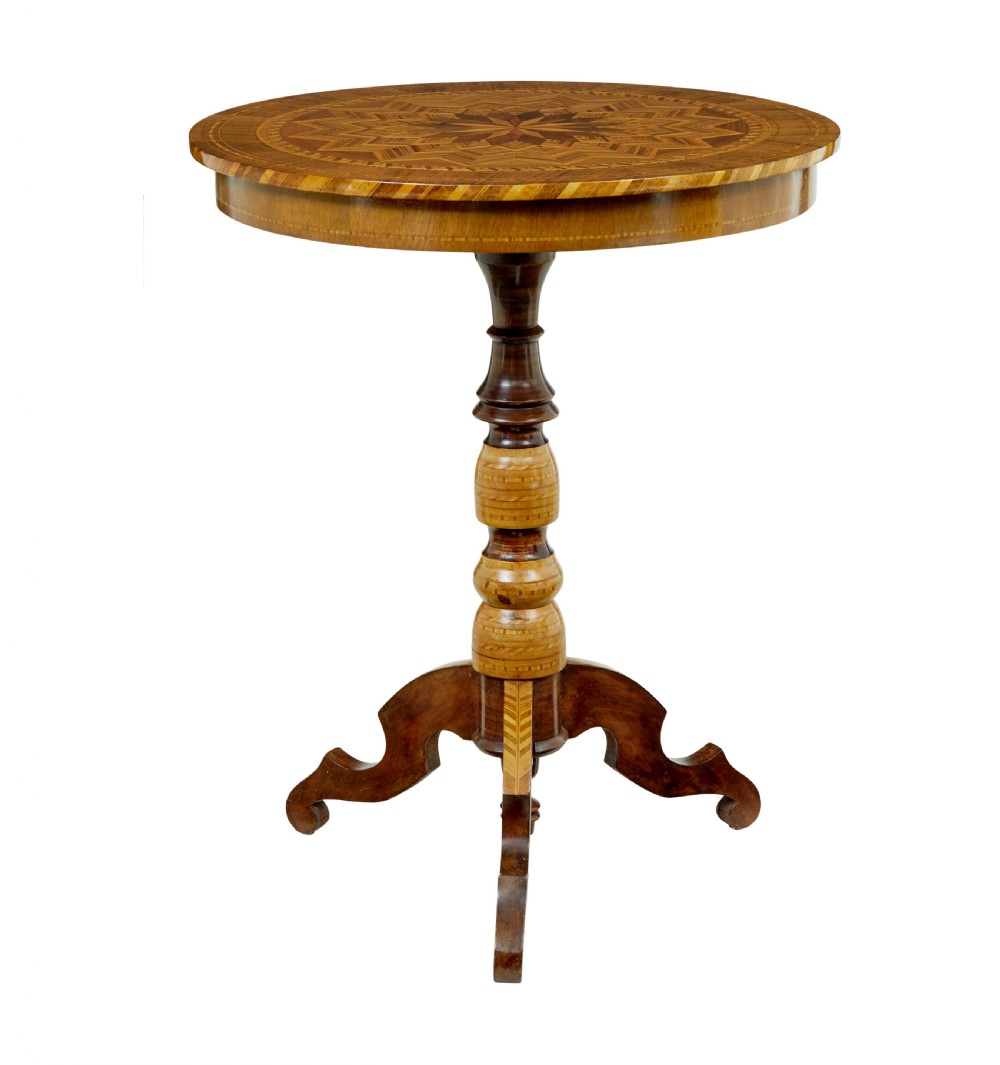 A 19th-century Italian Sorrento table featuring a circular top with geometric marquetry, a turned central column stem, and carved tripod legs.
