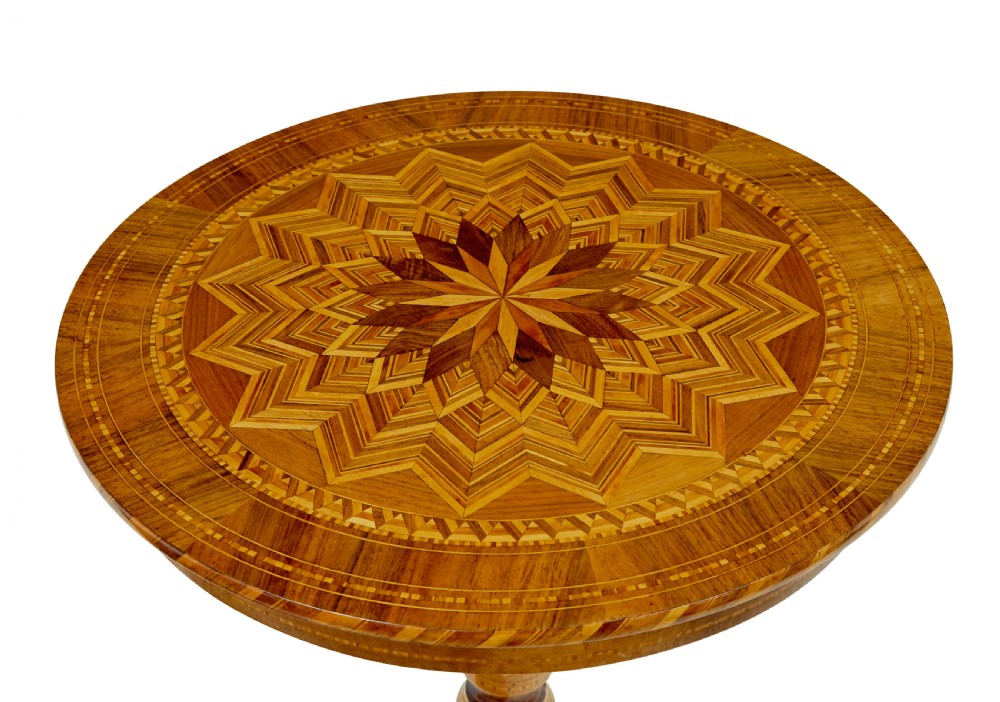 A 19th-century Italian Sorrento table featuring a circular top with geometric marquetry, a turned central column stem, and carved tripod legs. View IV
