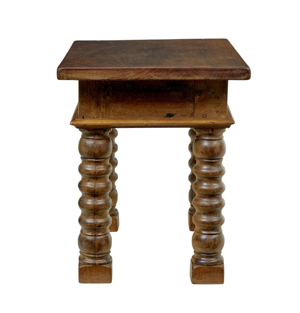 A 19th-century Dutch oak side table featuring a rectangular top and four thick turned legs with square block feet. View III