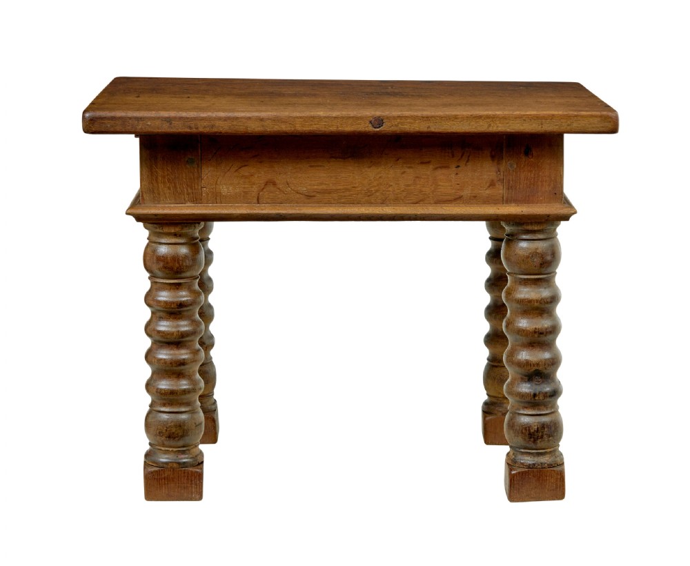 A 19th-century Dutch oak side table featuring a rectangular top and four thick turned legs with square block feet. View IV