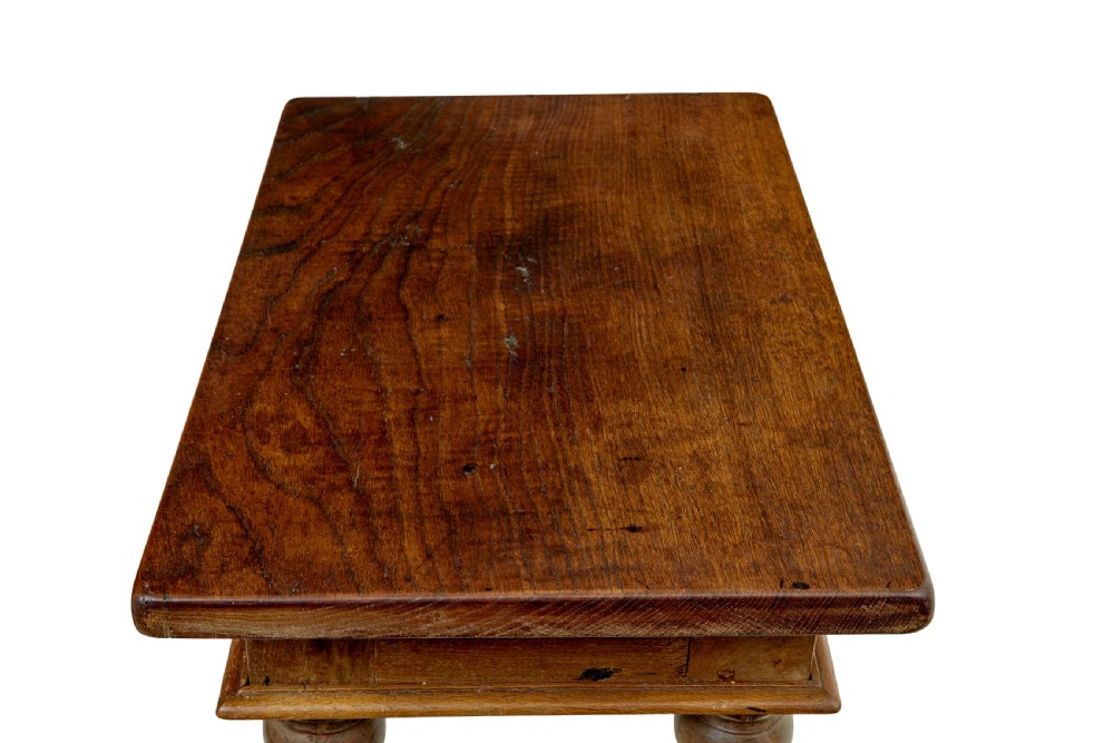 A 19th-century Dutch oak side table featuring a rectangular top and four thick turned legs with square block feet. View VIII