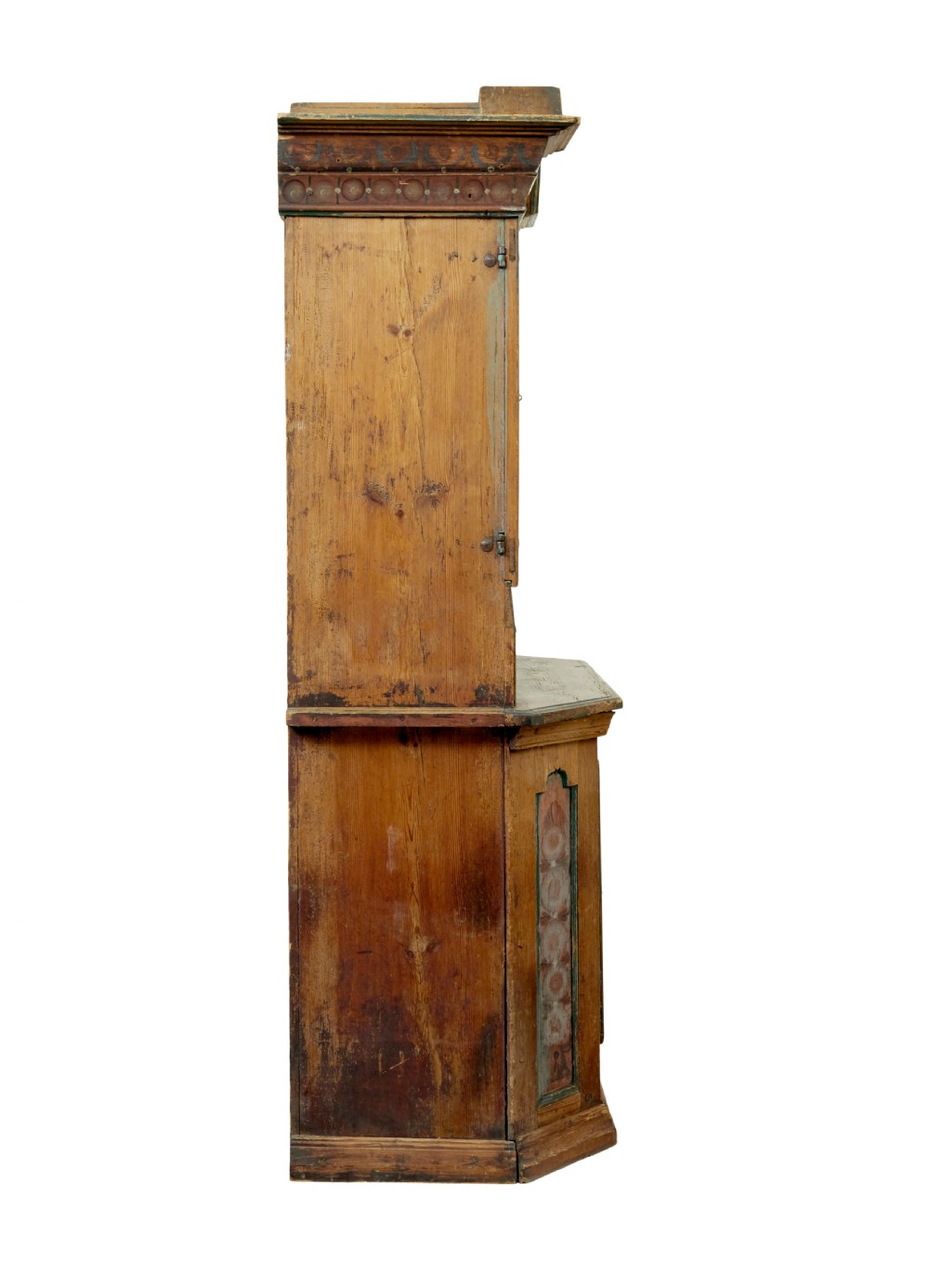 An early nineteenth-century Swedish painted pine cupboard featuring a shaped upper section with painted panel doors dated 1813 above an open shelf and lower cabinet. View VI
