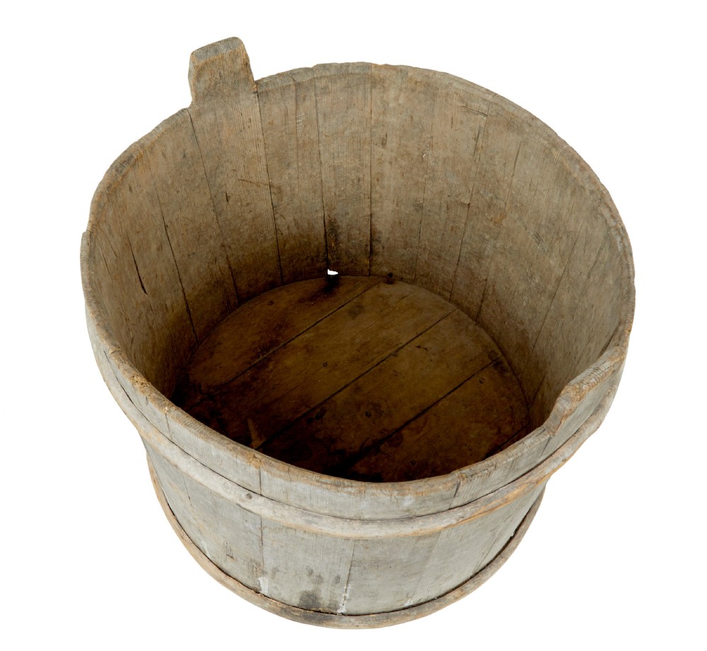 A large round 19th-century Scandinavian pine storage barrel featuring vertical stave timber construction and thick wooden binding hoops around the top and bottom. View VIII