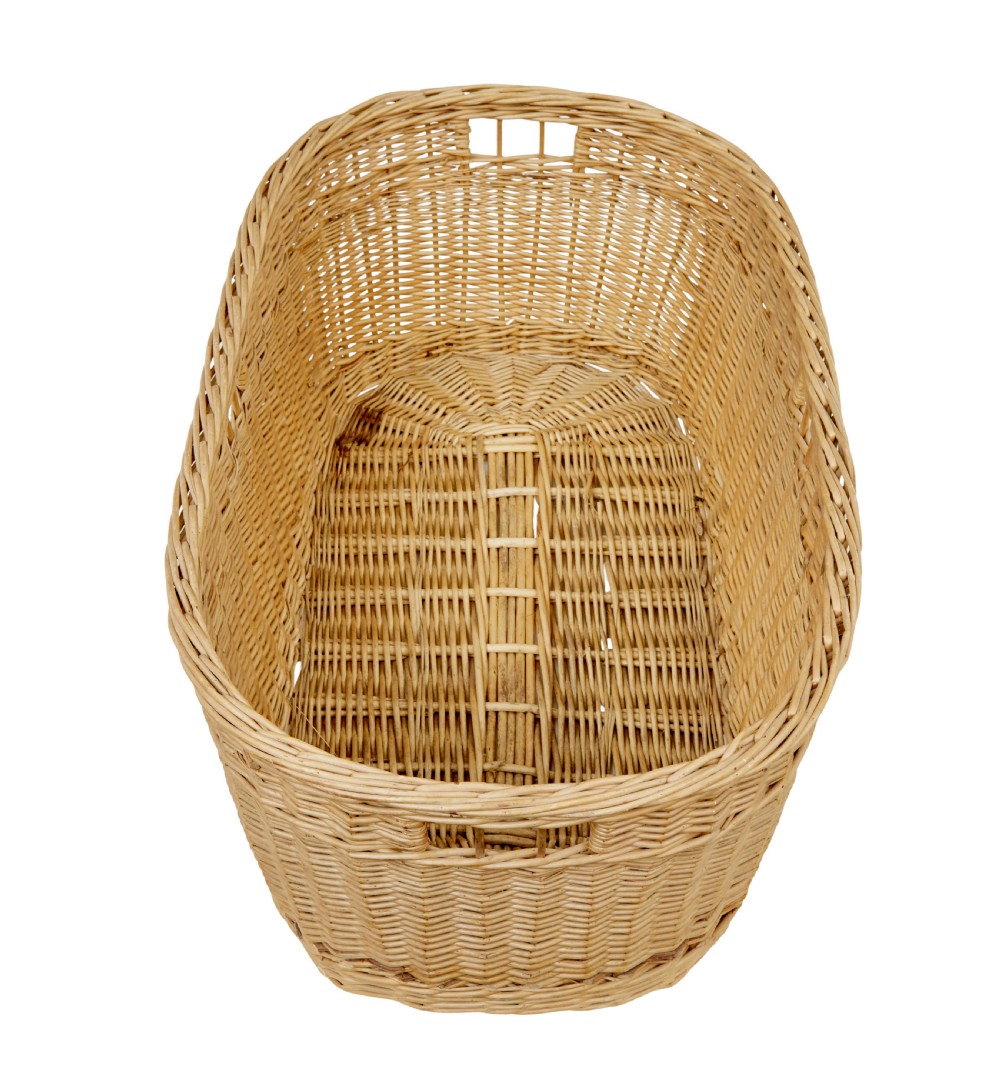 An oval hand-woven natural wicker basket featuring tight weave patterns and integrated cut-out handles near the upper rim. View II