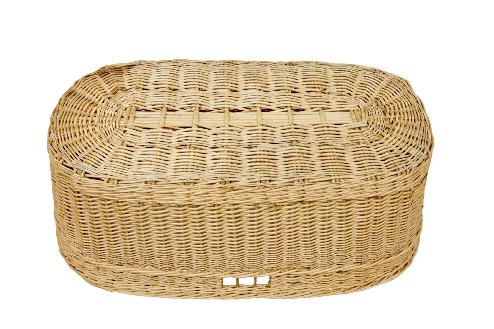 An oval hand-woven natural wicker basket featuring tight weave patterns and integrated cut-out handles near the upper rim. View IV