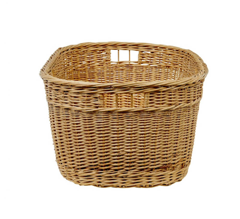 An oval hand-woven natural wicker basket featuring tight weave patterns and integrated cut-out handles near the upper rim. View VI