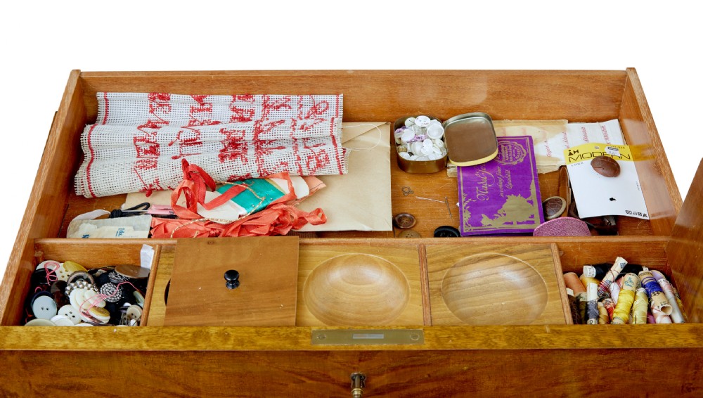 A late nineteenth-century warm golden birch sewing table featuring a single drawer with a brass keyhole, supported by a lyre-shaped pedestal on a plinth base with bun feet. View III