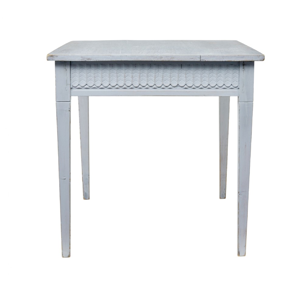 A late 19th-century Swedish painted pine table featuring a rectangular top, a carved patterned apron, and four square tapered legs. View III