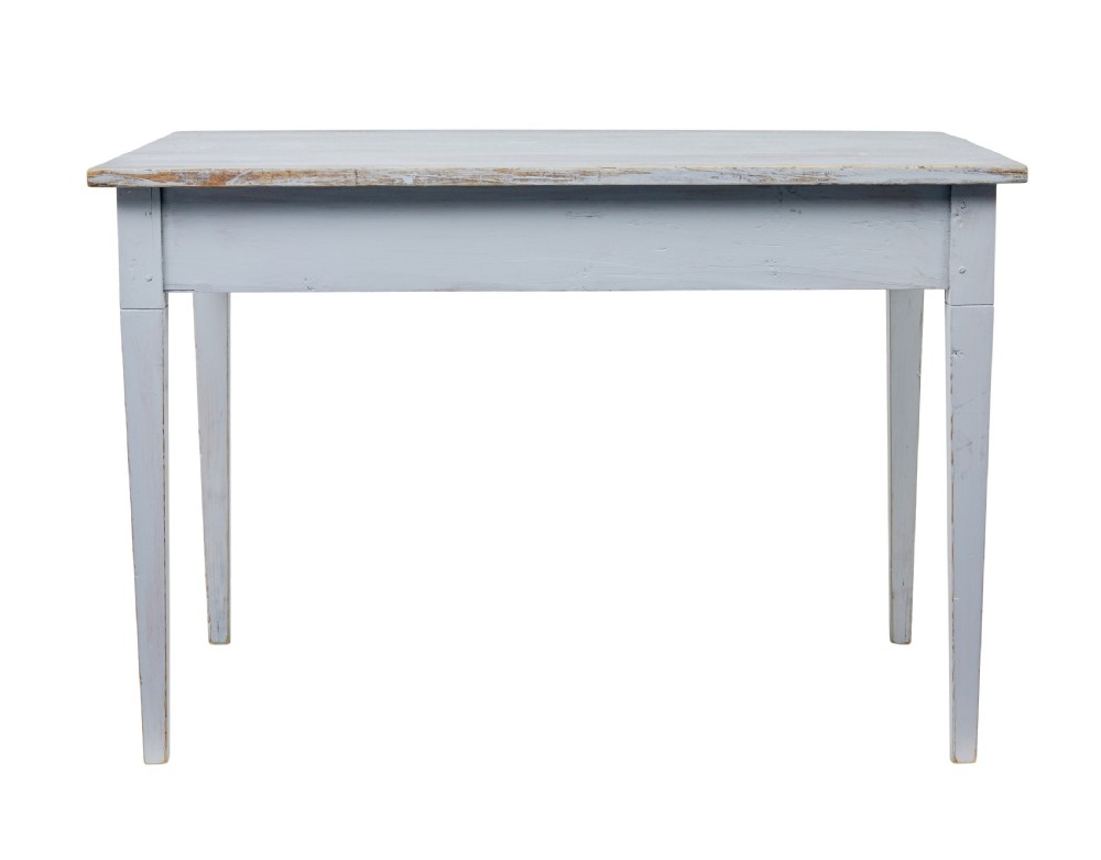 A late 19th-century Swedish painted pine table featuring a rectangular top, a carved patterned apron, and four square tapered legs. View IV