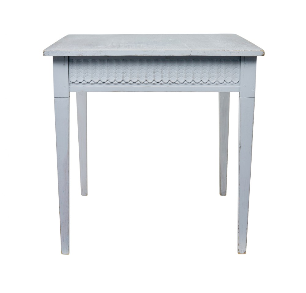 A late 19th-century Swedish painted pine table featuring a rectangular top, a carved patterned apron, and four square tapered legs. View V
