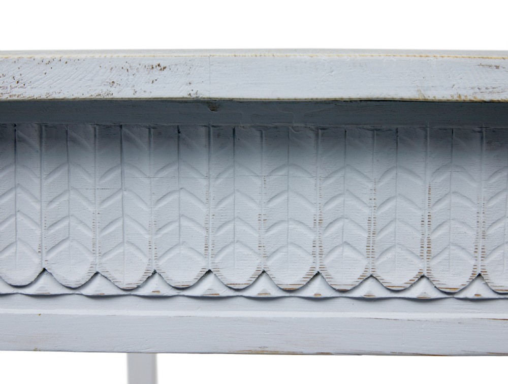 A late 19th-century Swedish painted pine table featuring a rectangular top, a carved patterned apron, and four square tapered legs. View VI