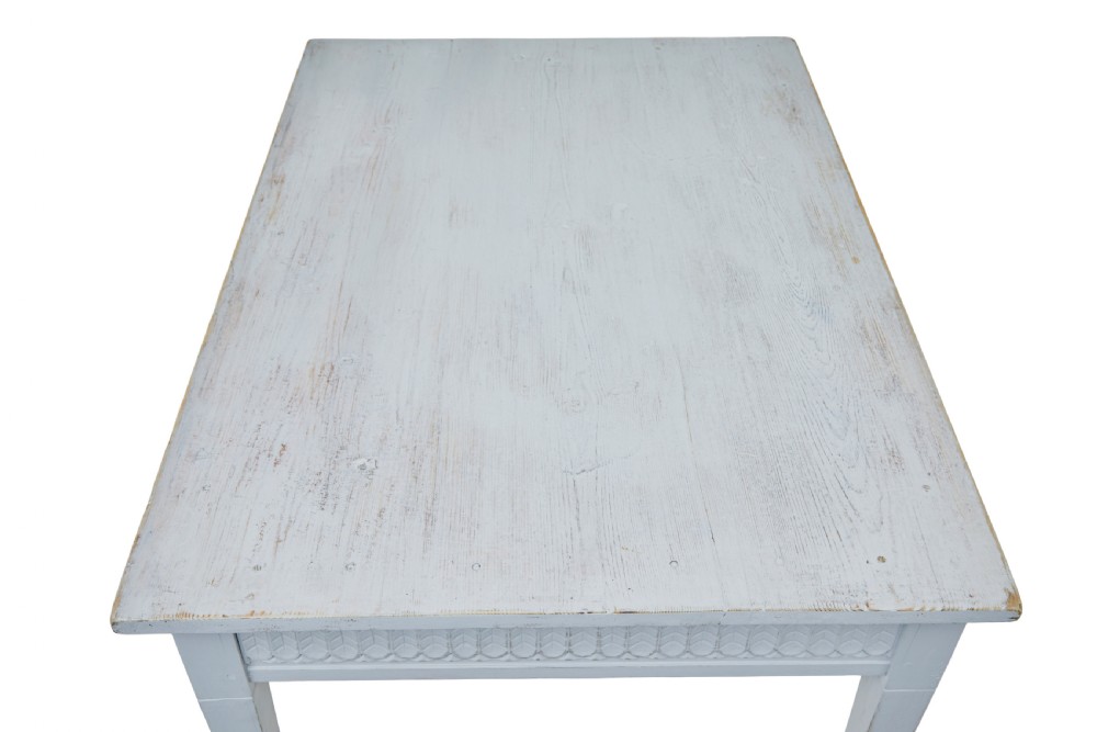 A late 19th-century Swedish painted pine table featuring a rectangular top, a carved patterned apron, and four square tapered legs. View VII