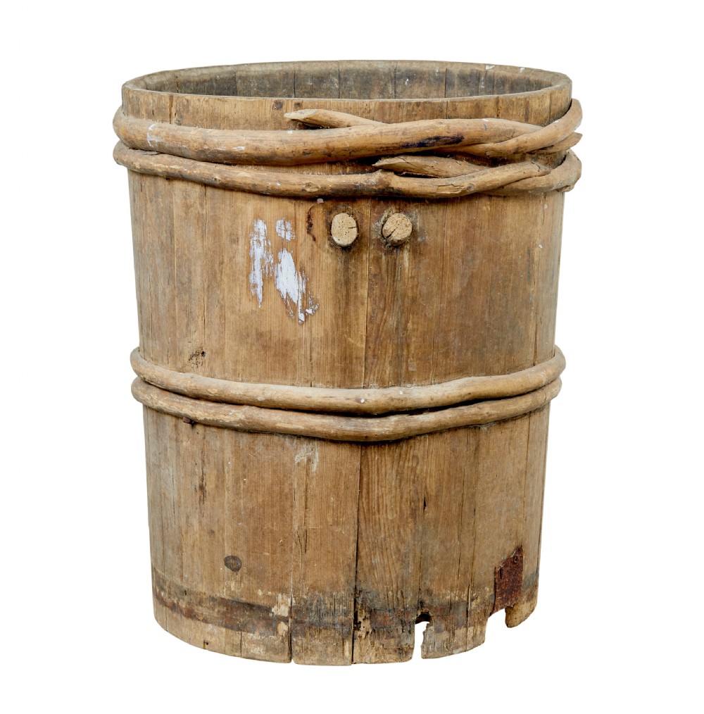 A 19th-century cylindrical Swedish pine barrel featuring hand-bound branch hoops, iron fittings, and remnants of blue paint. View III