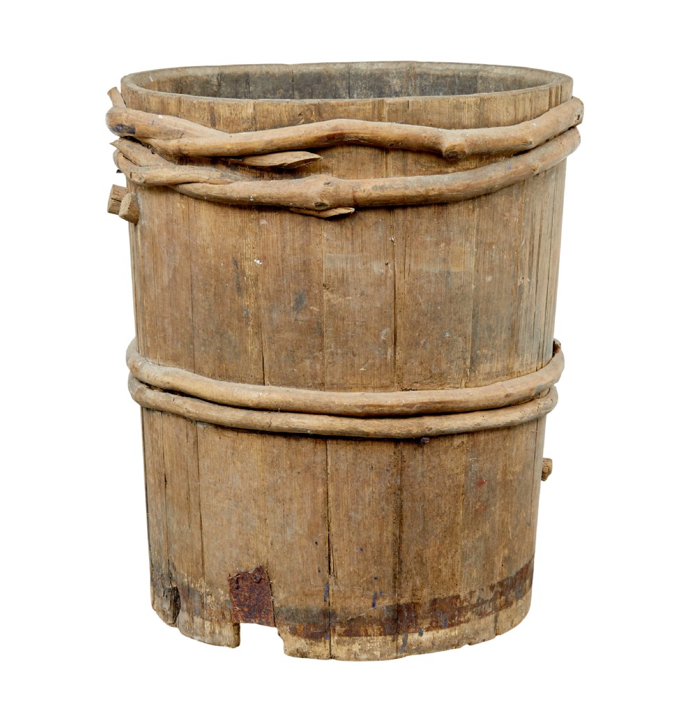 A 19th-century cylindrical Swedish pine barrel featuring hand-bound branch hoops, iron fittings, and remnants of blue paint. View IV