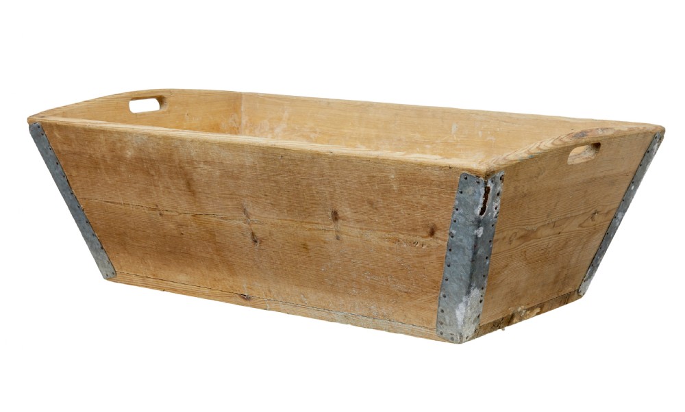 A 19th-century rectangular Swedish pine dough bin featuring tapered sides, metal corner reinforcements, and cut-out handles at each end.