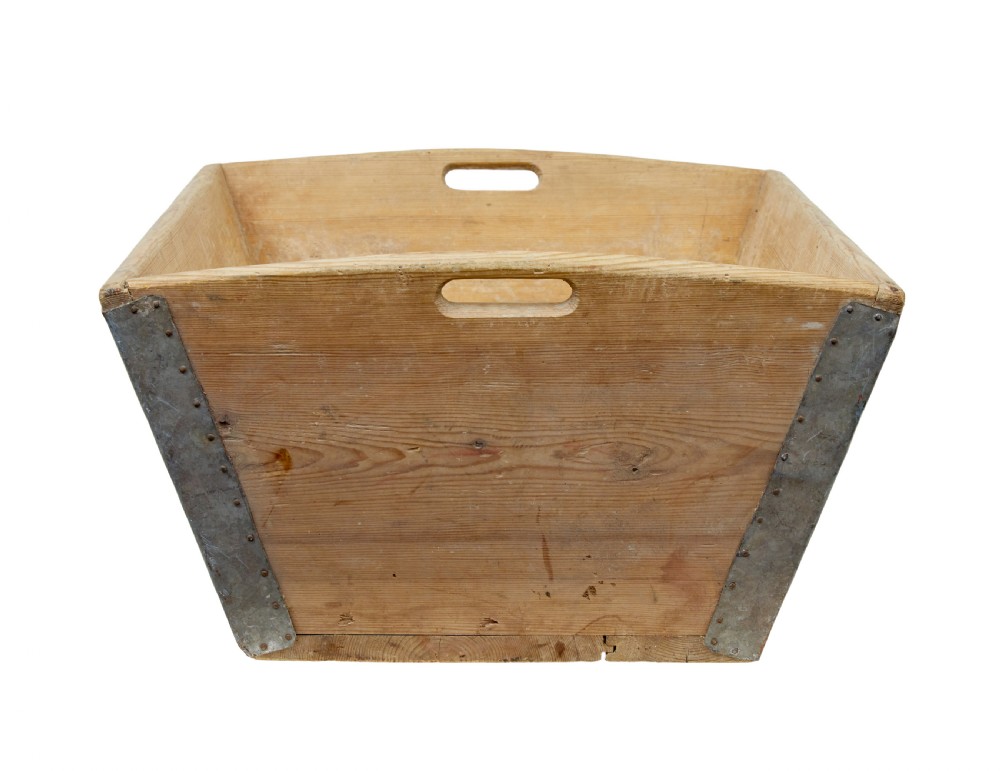 A 19th-century rectangular Swedish pine dough bin featuring tapered sides, metal corner reinforcements, and cut-out handles at each end. View VI