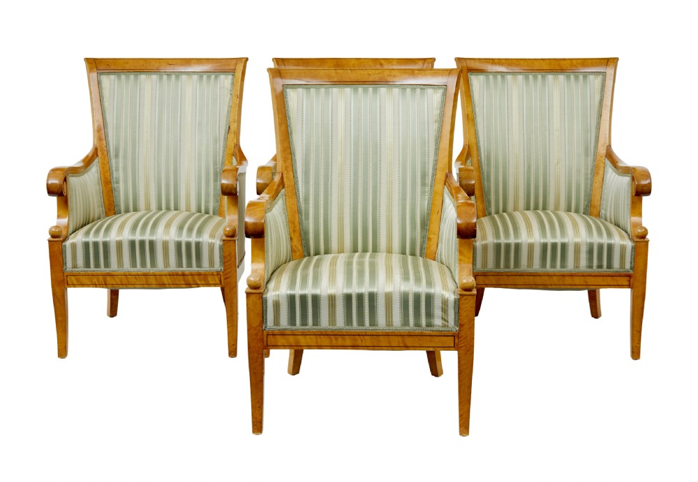 A set of four early 20th-century Karl Johan style birch armchairs featuring scroll arms and green striped upholstery. View II