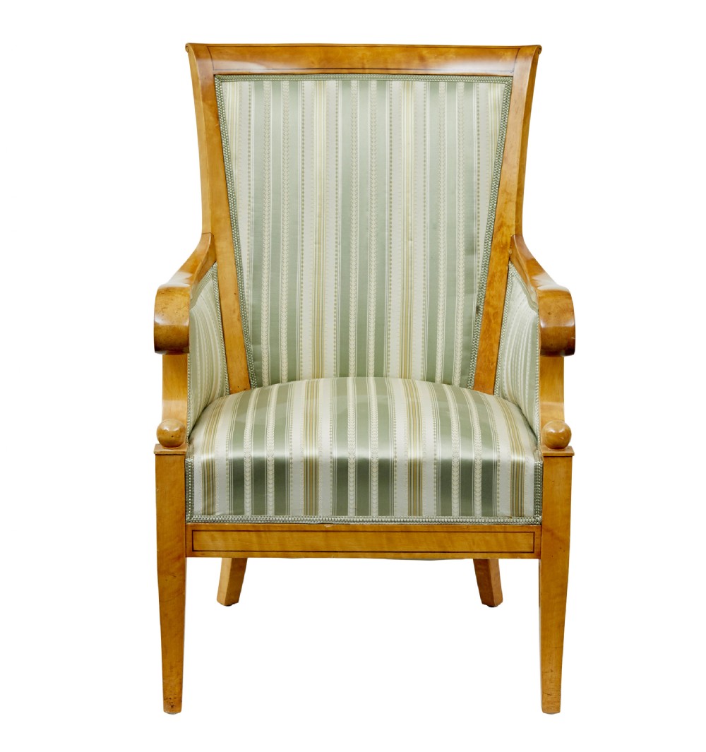 A set of four early 20th-century Karl Johan style birch armchairs featuring scroll arms and green striped upholstery. View III