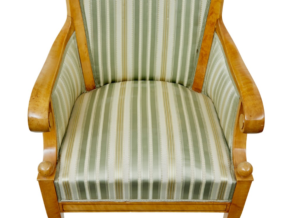 A set of four early 20th-century Karl Johan style birch armchairs featuring scroll arms and green striped upholstery. View VIII