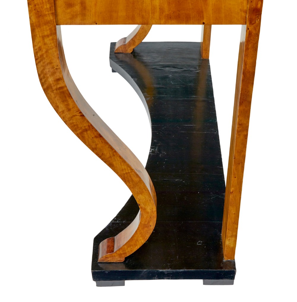 A nineteenth-century Empire Revival console table crafted from figured burr birch with curved leg supports and an ebonised plinth base. View VII