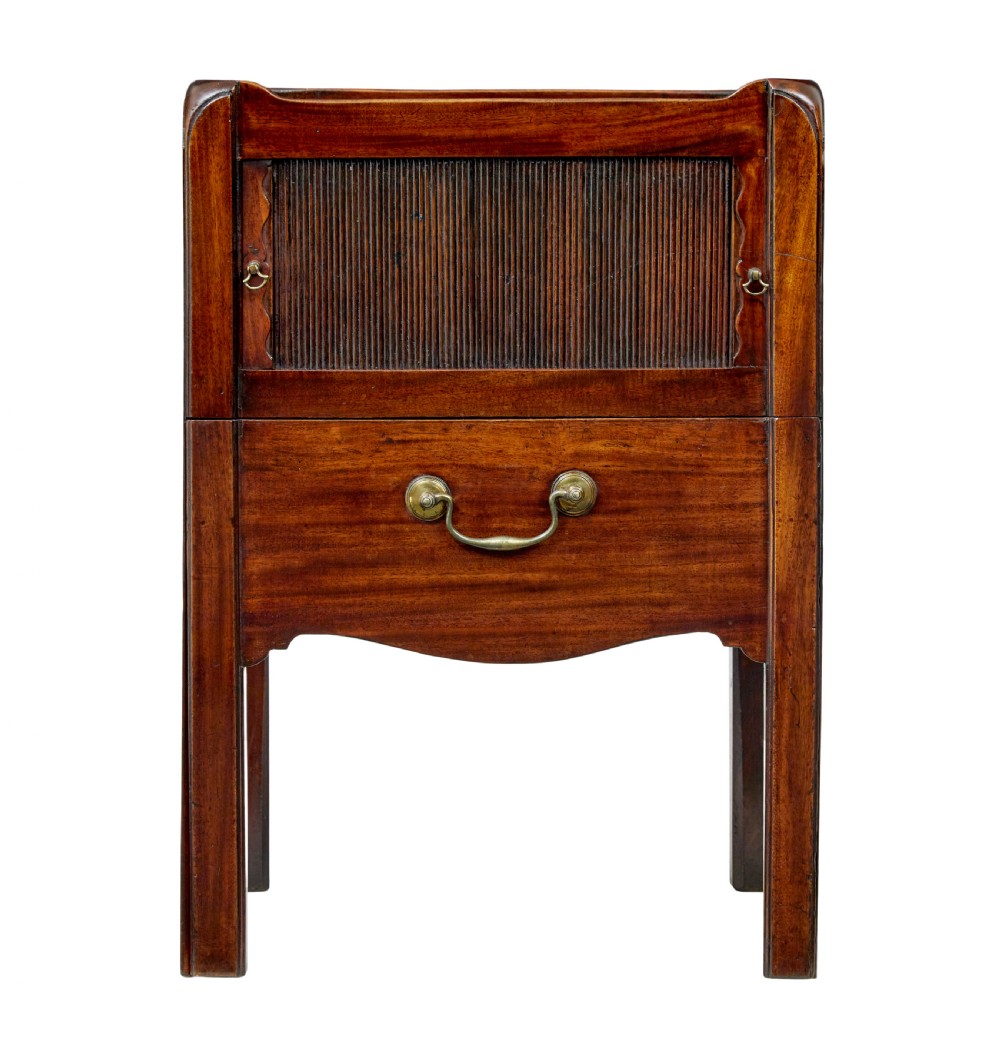 A 19th-century Georgian mahogany bedside table featuring a gallery top with hand-holds, a sliding tambour door, and a drawer with a brass handle. View III