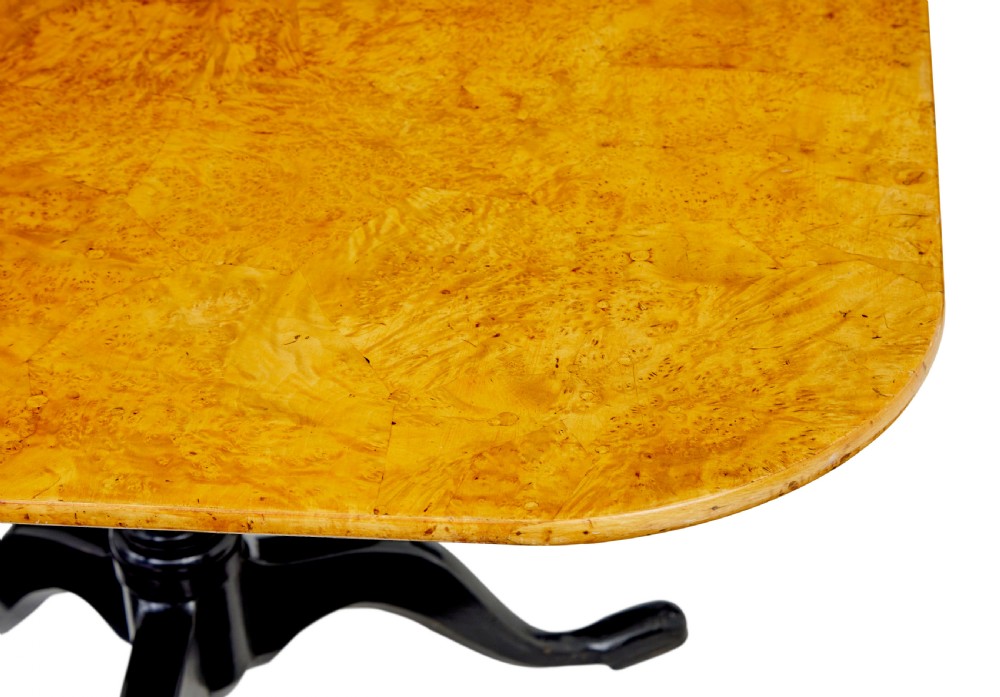 A 19th-century Swedish tripod table featuring a rounded rectangular burr birch top set on a black turned pedestal with three curved legs. View IV