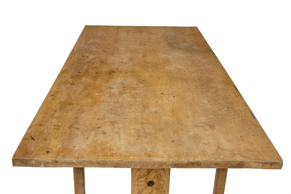 A 19th-century Swedish oak and pine trestle table with a flat rectangular top and timber stretcher base. View VIII
