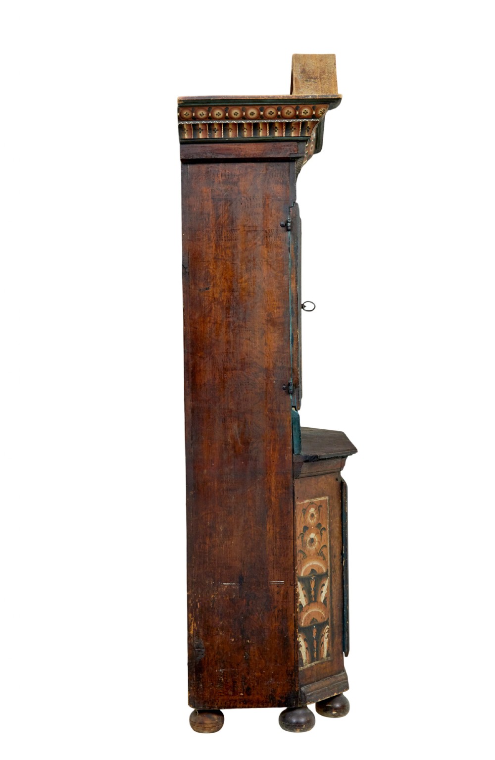An early nineteenth-century Swedish painted wooden cupboard featuring floral folk art motifs, a shaped cornice dated 1804, and turned bun feet. View XI
