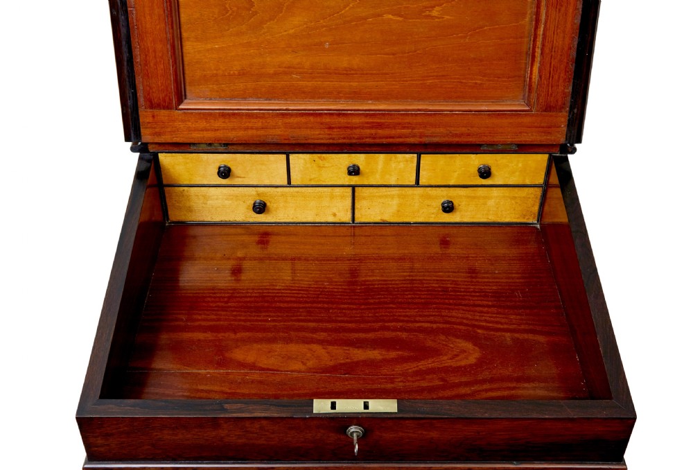 A mid-19th-century dark mahogany Davenport writing desk with a green leather gilded slant top, side drawers, and a balustrade gallery. View VIII