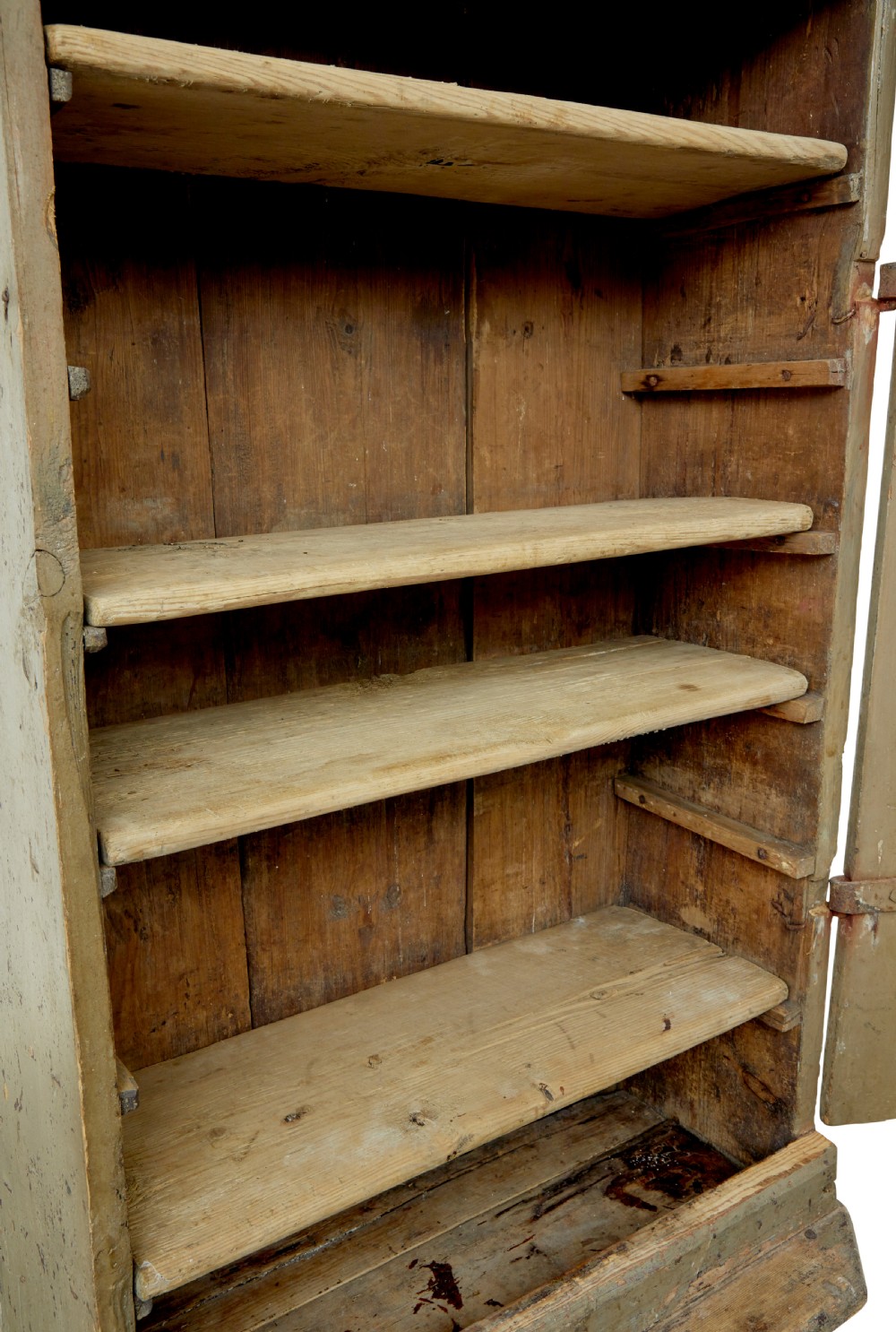 A tall early 19th-century Scandinavian pine cupboard featuring two doors with reeded panelling and a distressed pale green painted finish. View X