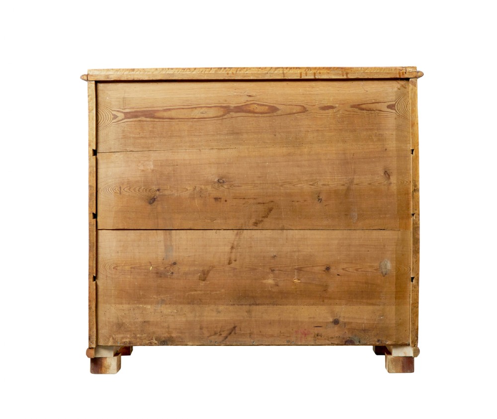 A mid-19th-century Swedish secretaire chest featuring highly figured burr birch veneers, four horizontal drawers, ornate brass handles, and block feet. View V