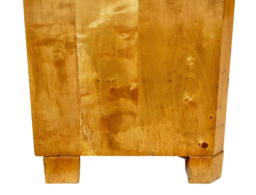 A nineteenth-century Swedish two-door cupboard constructed from golden tiger birch wood with two upper drawers and carved corner corbels. View VIII