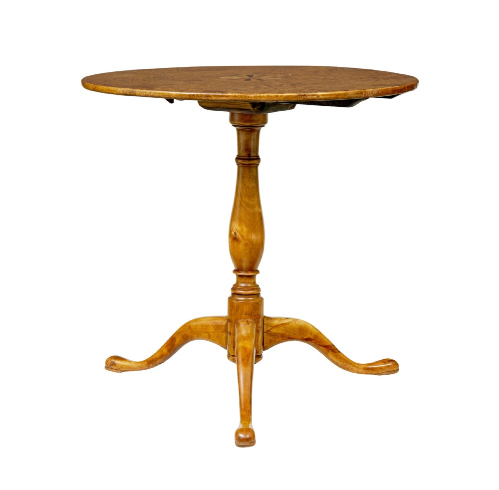 A mid-19th-century Swedish circular occasional table featuring a burr birch top with central star inlay, supported by a turned pedestal stem and tripod legs. View II