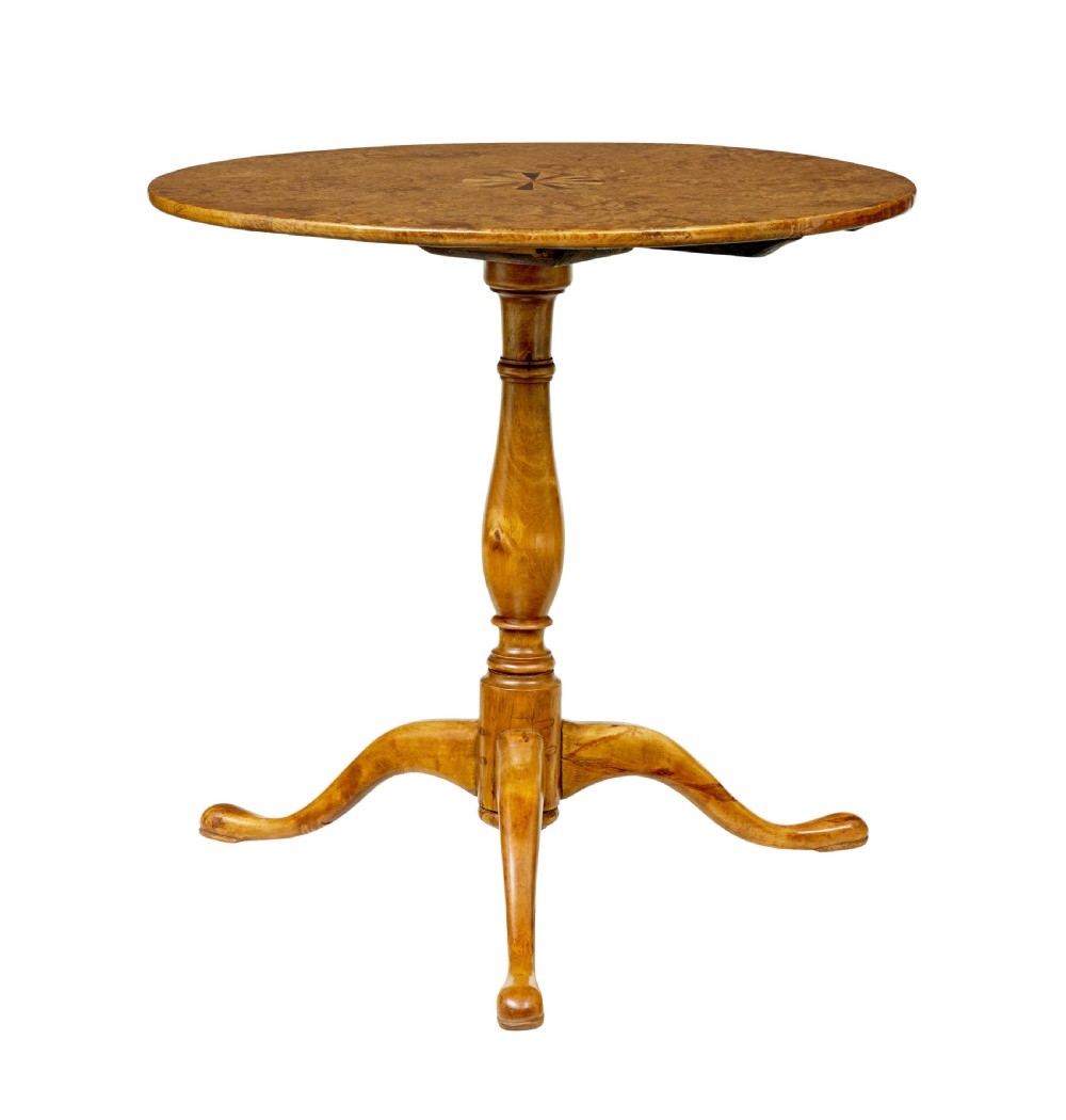 A mid-19th-century Swedish circular occasional table featuring a burr birch top with central star inlay, supported by a turned pedestal stem and tripod legs. View III