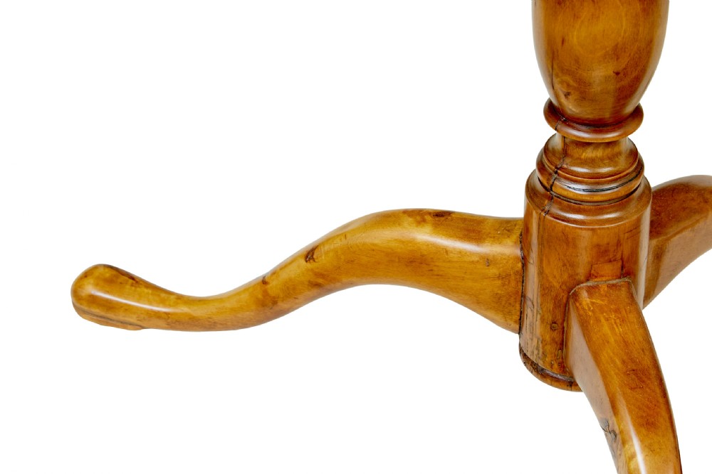 A mid-19th-century Swedish circular occasional table featuring a burr birch top with central star inlay, supported by a turned pedestal stem and tripod legs. View V