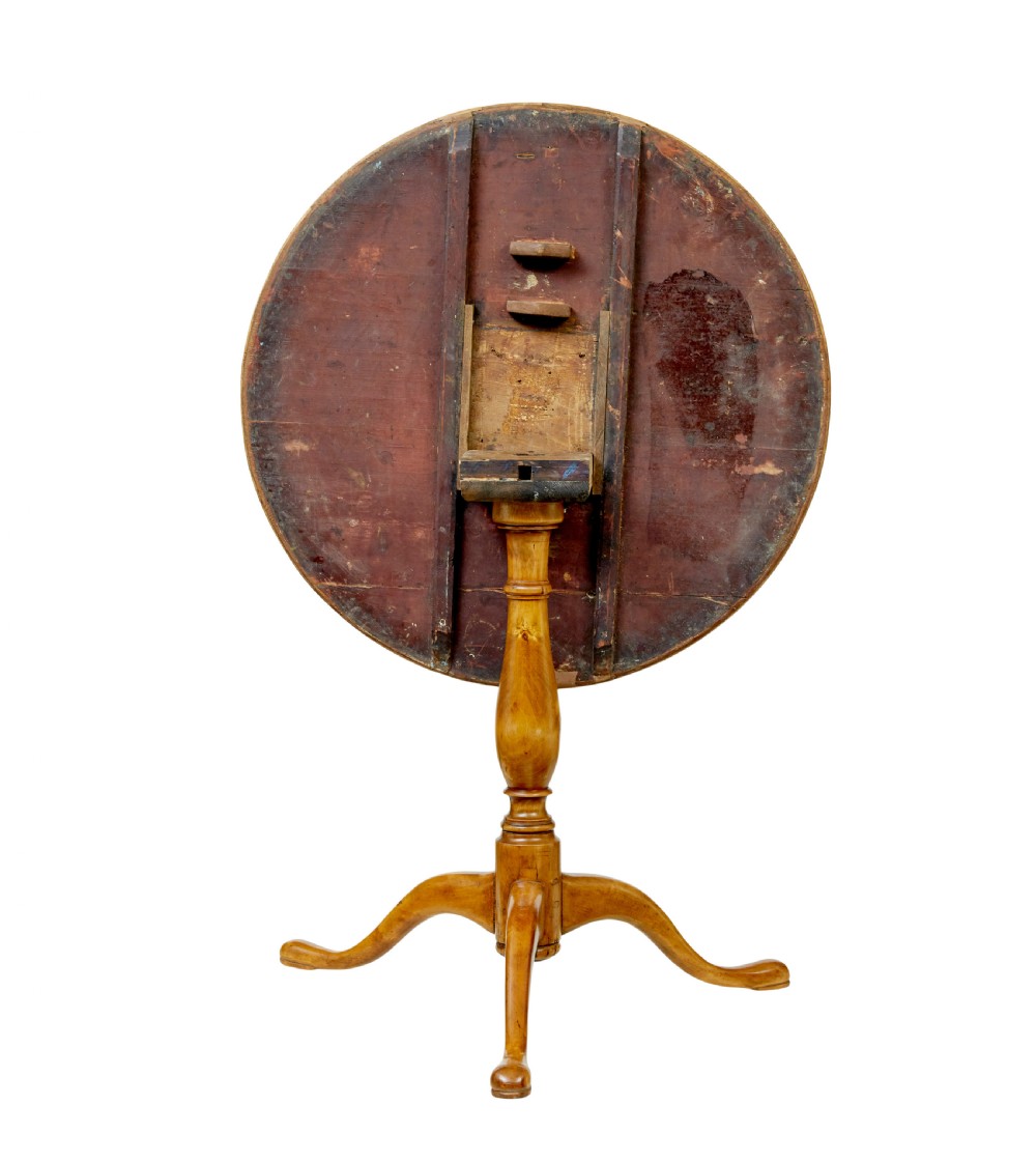 A mid-19th-century Swedish circular occasional table featuring a burr birch top with central star inlay, supported by a turned pedestal stem and tripod legs. View VI
