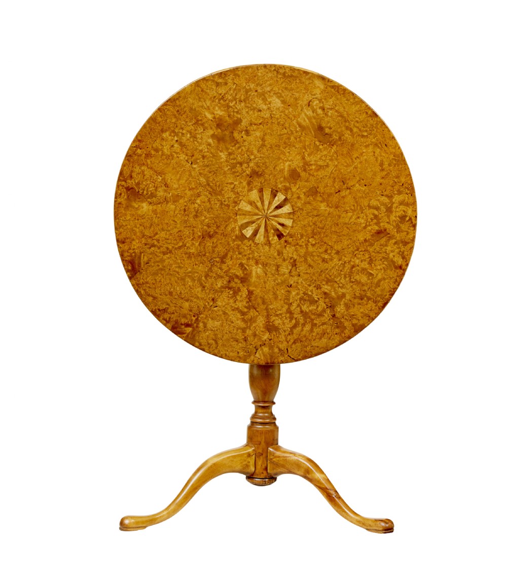 A mid-19th-century Swedish circular occasional table featuring a burr birch top with central star inlay, supported by a turned pedestal stem and tripod legs. View VII