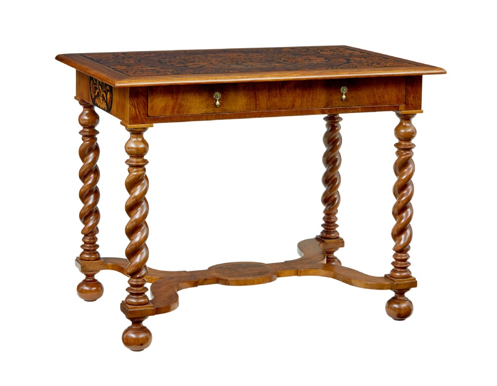 A 19th-century rectangular walnut table featuring intricate floral marquetry inlay on the top surface, a single drawer, four spiral twist legs, and a shaped stretcher.