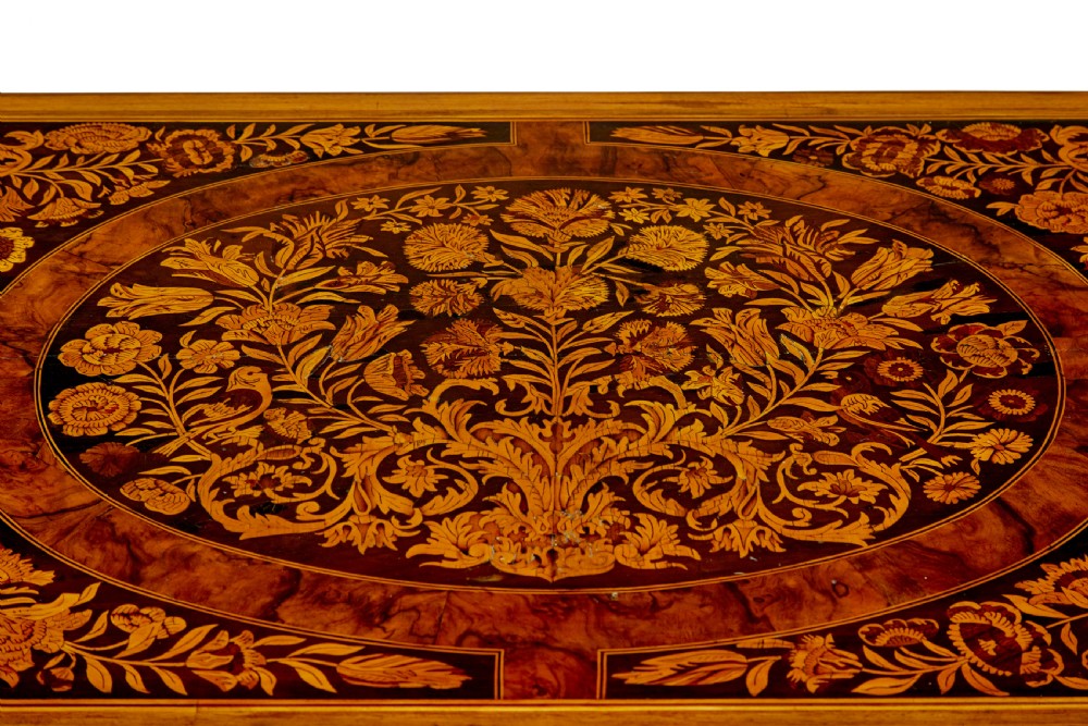 A 19th-century rectangular walnut table featuring intricate floral marquetry inlay on the top surface, a single drawer, four spiral twist legs, and a shaped stretcher. View XI