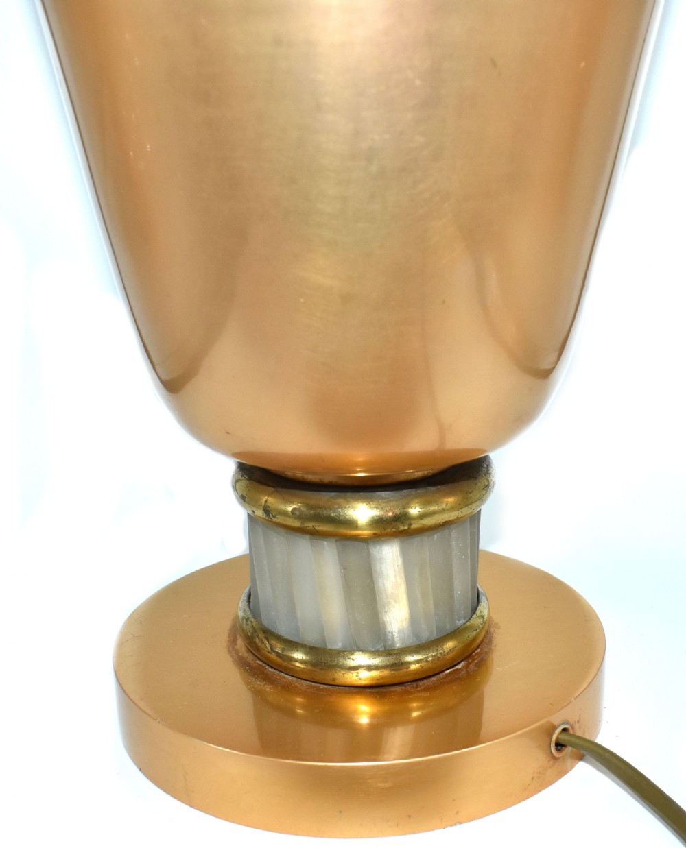 An Art Deco French copper-toned uplighter table lamp featuring a flared tulip shade mounted on a circular base with a ribbed glass collar. View III