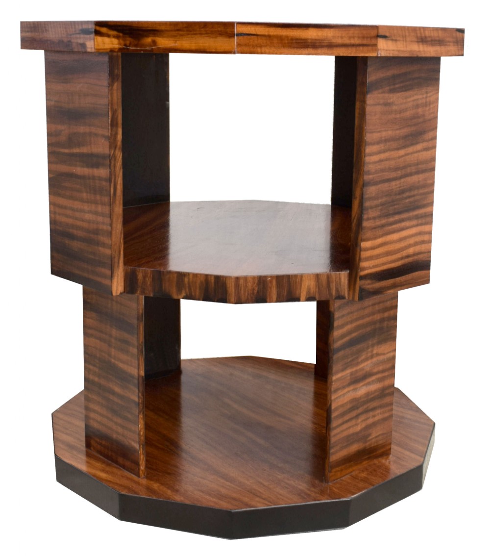 An octagonal three-tiered Art Deco revolving book table crafted from dark striped wood veneer. View II