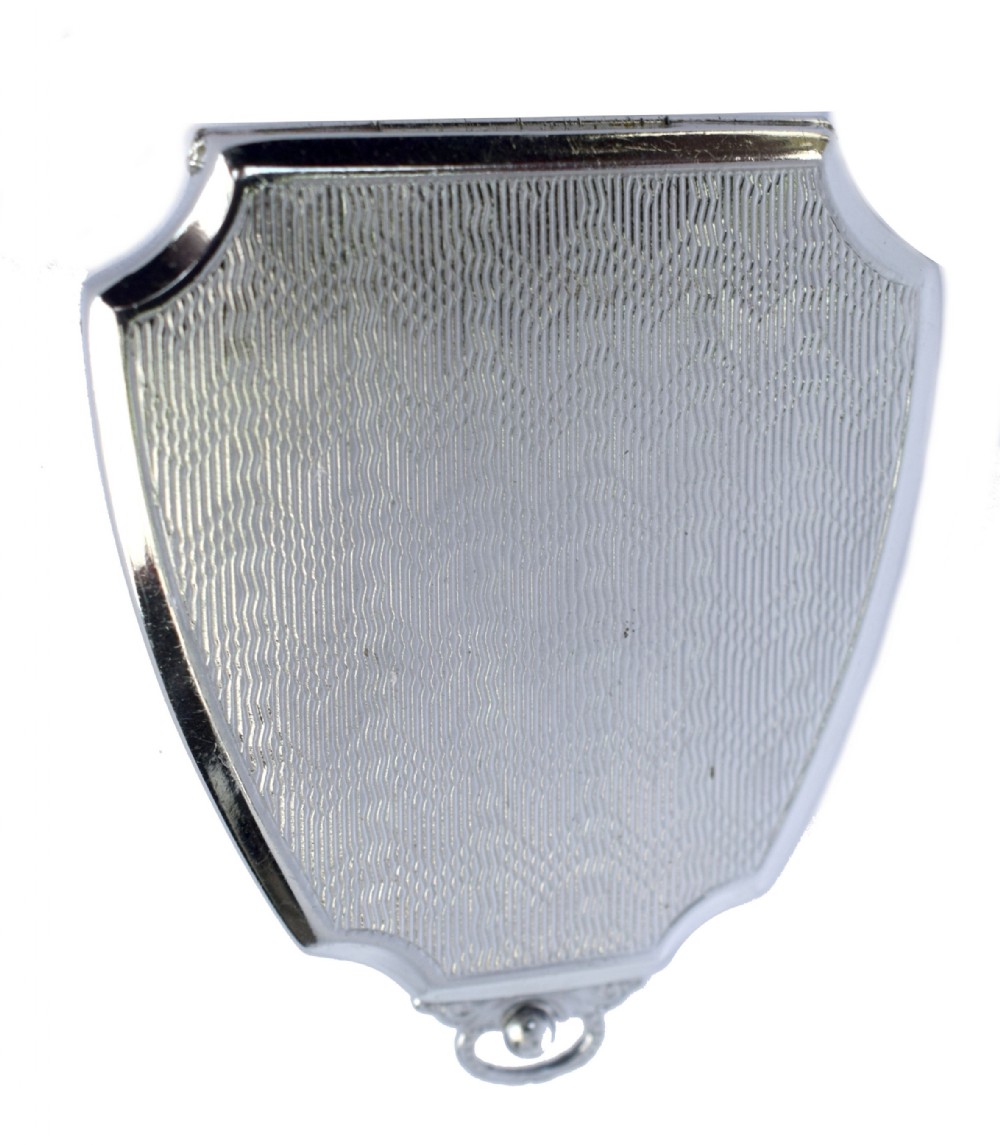 An Art Deco fan-shaped chrome powder compact with geometric blue, light blue, and black enamel panels and engine-turned metal details. View II