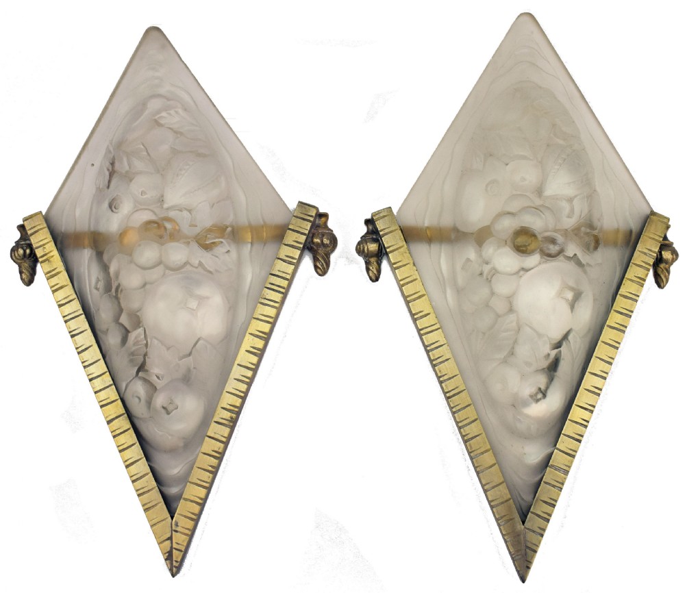 A pair of diamond-shaped Art Deco wall sconces featuring frosted glass with fruit relief designs held in incised bronze mounts. View VIII