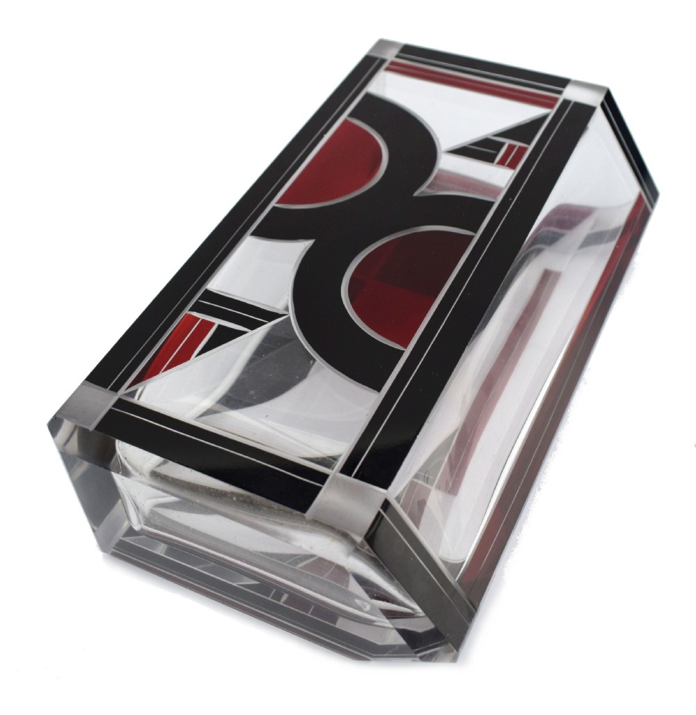 A rectangular clear glass Art Deco vase featuring geometric black and red enamel patterns. View XI