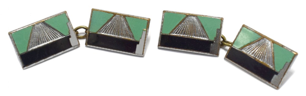 A pair of rectangular Art Deco cufflinks featuring green and black enamel with a central silver sunburst motif, connected by chain links. View III